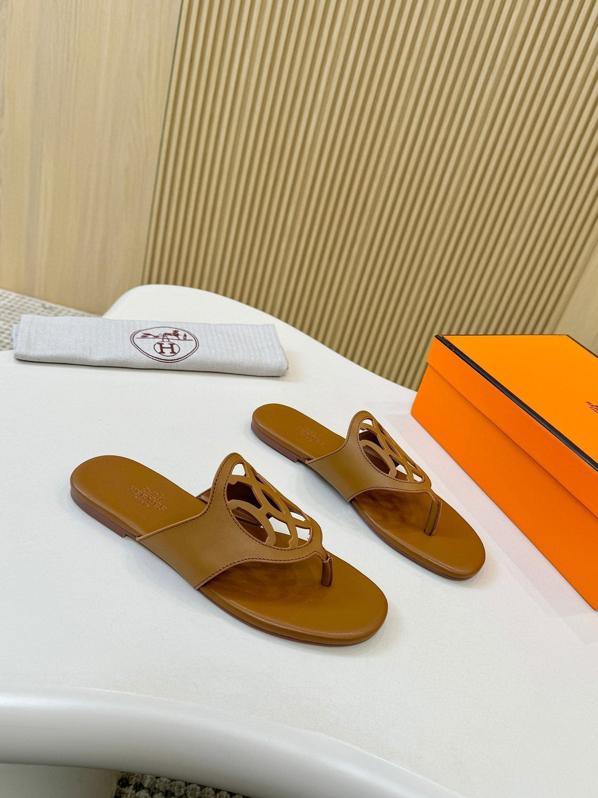 Hermès Brown Cutout Thong Sandals